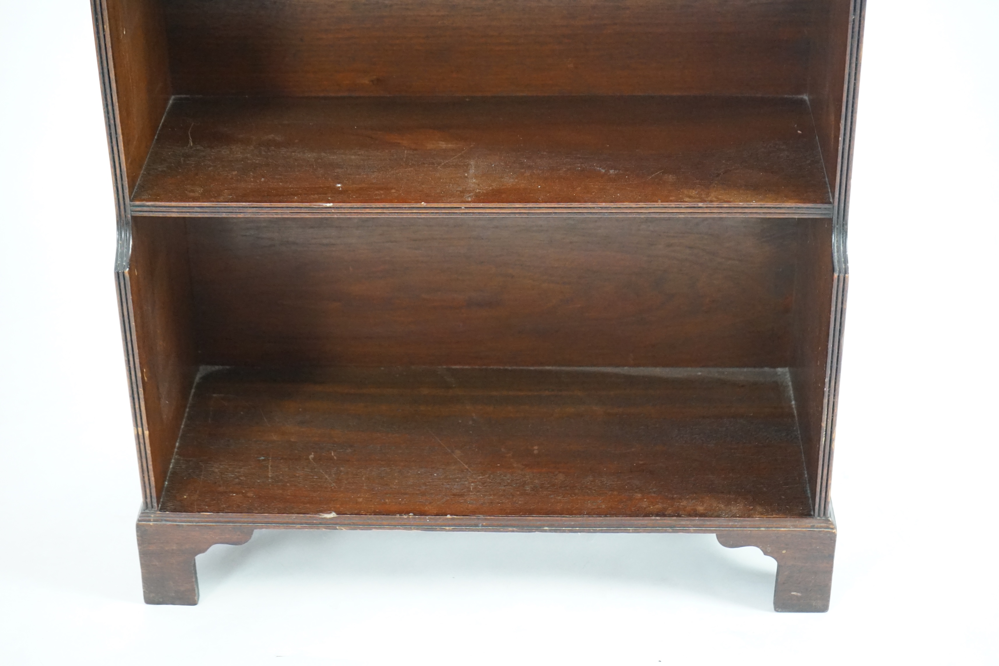 A Regency style mahogany waterfall bookcase